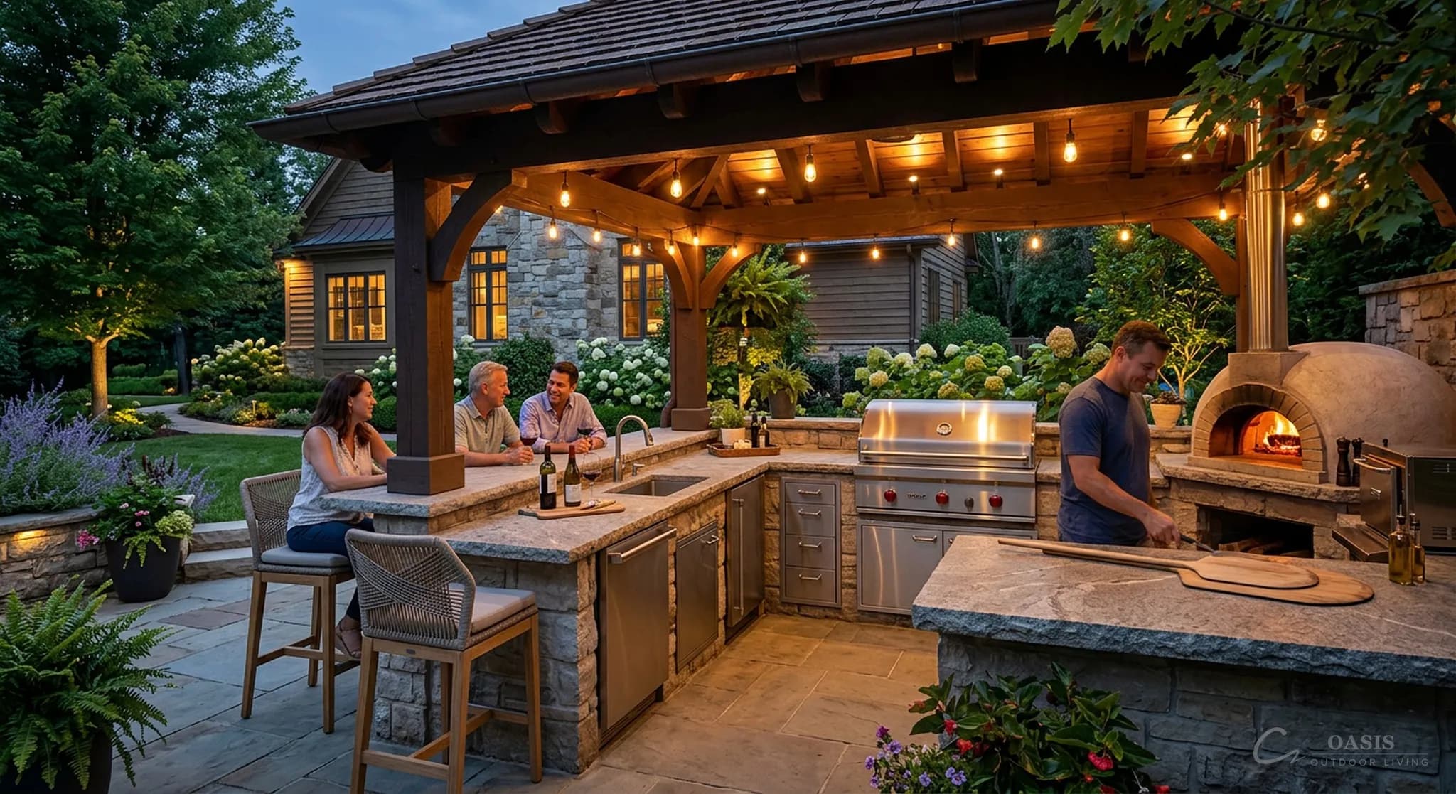 Outdoor kitchen with friends gathering at dusk
