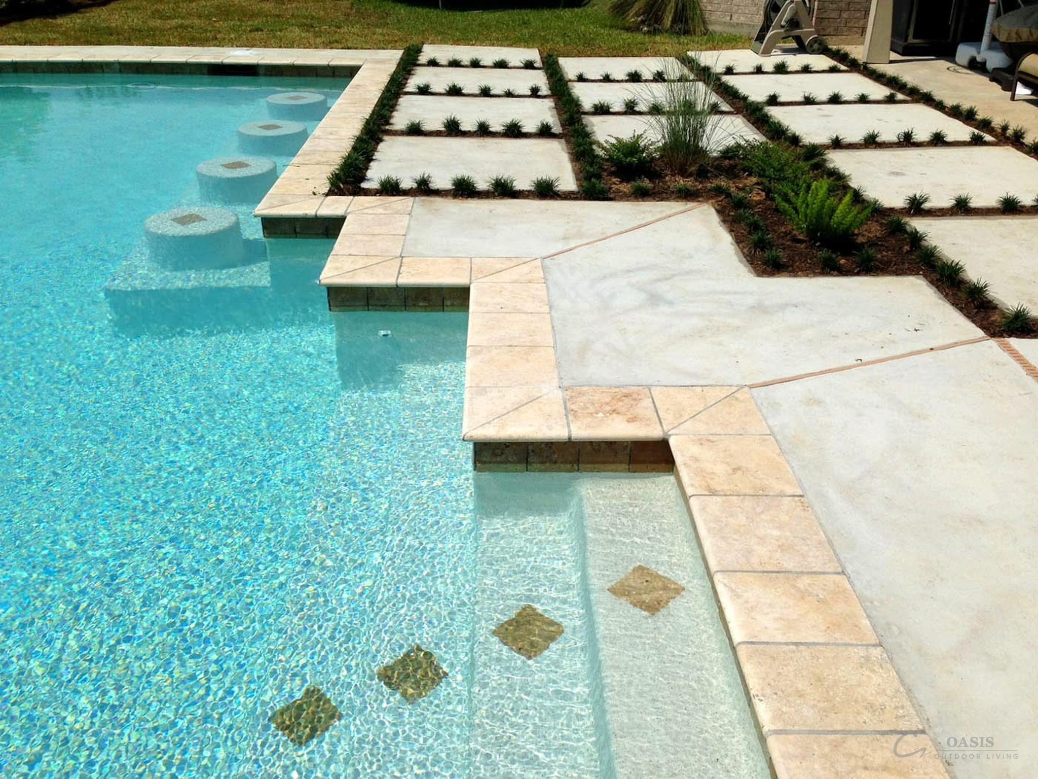 Travertine pool edge with stepping stones